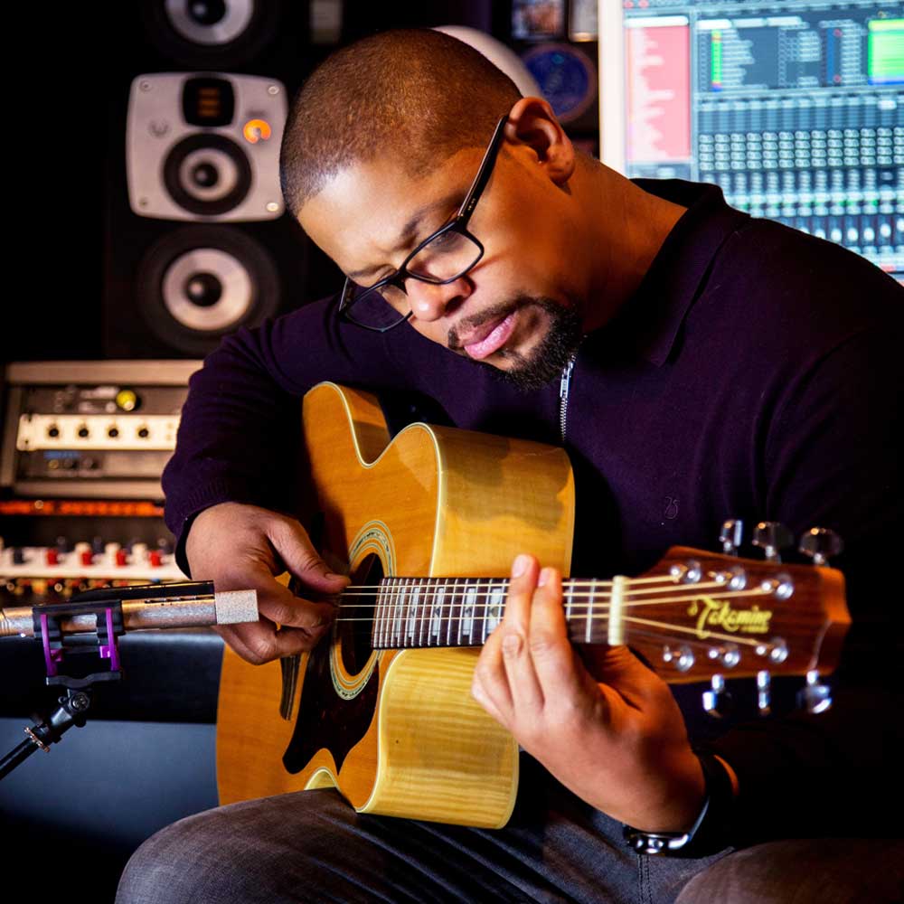 Troy recording his guitar with a Starlight